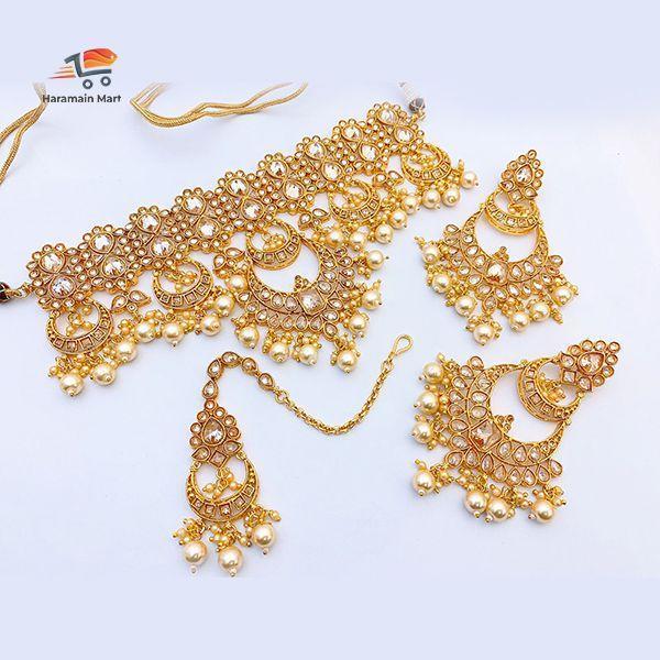 Golden Necklace, Earings, Mang tikka, Golden Color Artificial Necklace with Chand bali, Chand Bali earrings.